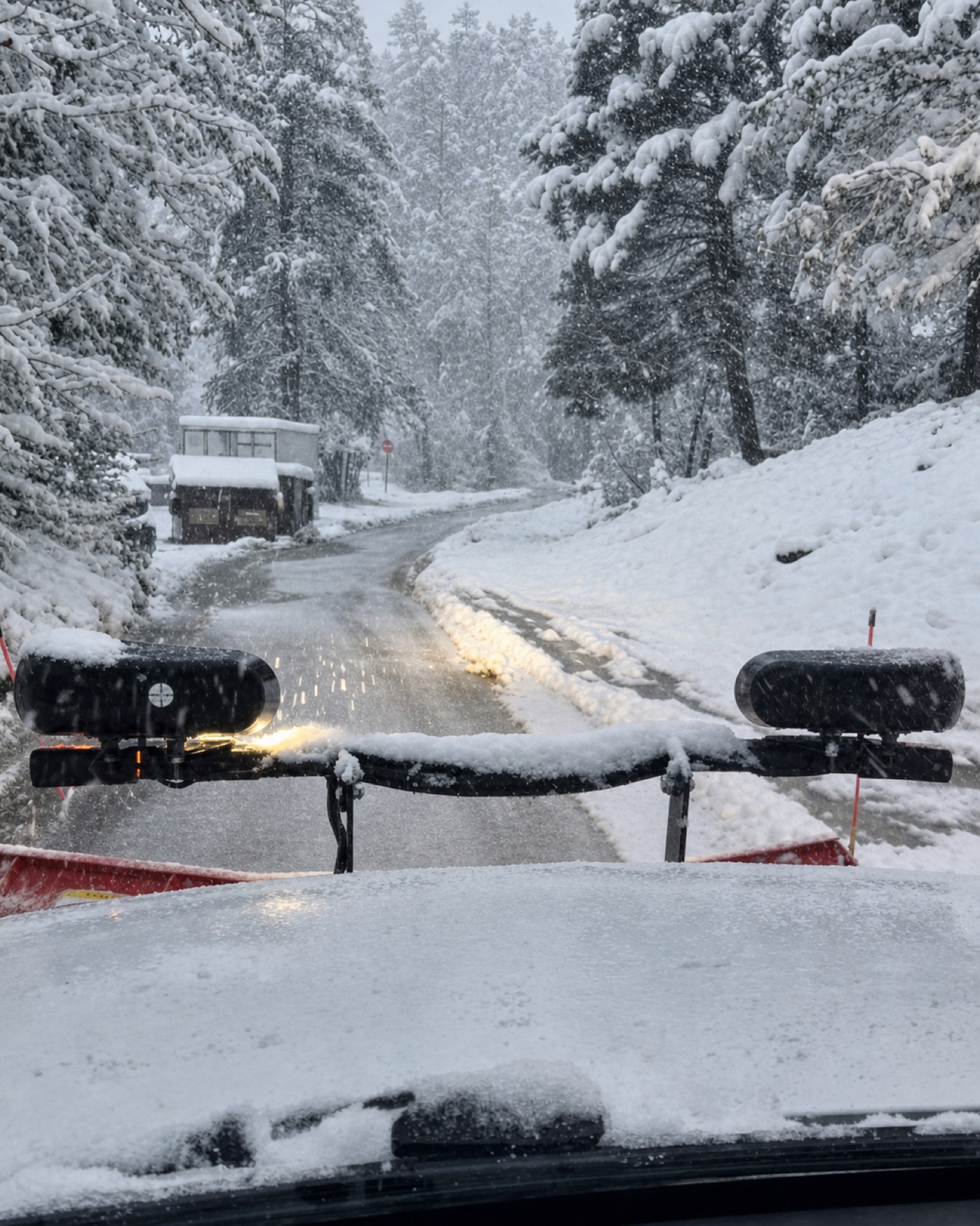 View from an Erie Lawn Boys plow operating during a heavy Colorado snowstorm